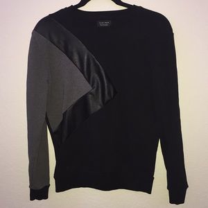 Black jumper/sweater with pleather design.